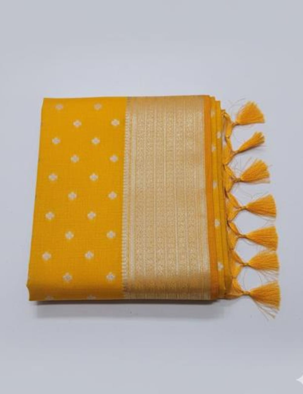 Radiant Mango Yellow Tussar Silk Saree with Golden Zari Border & Tassel Finish