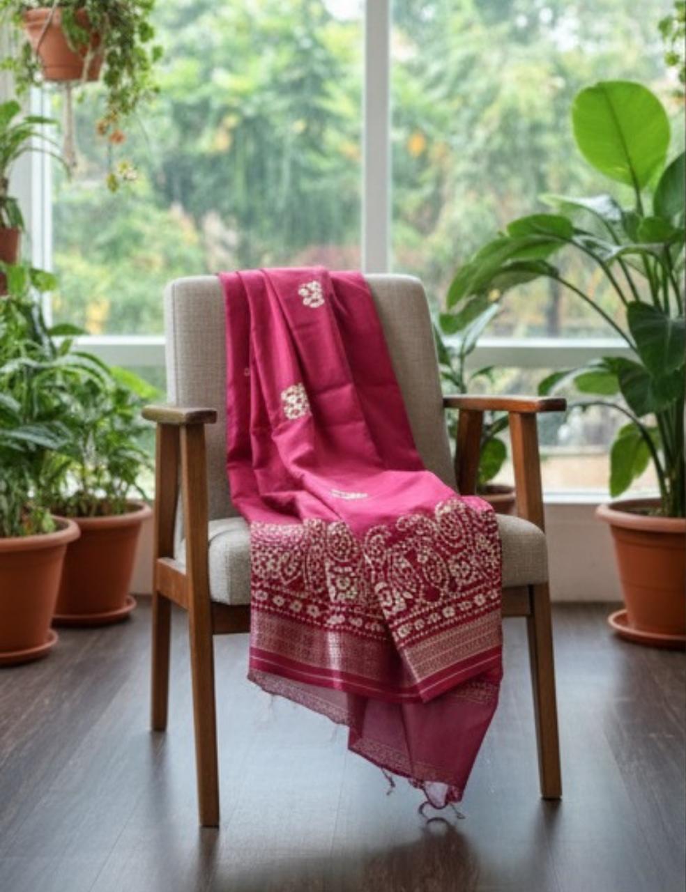 Graceful Deep Pink Silk Saree with Intricate White Motif Border