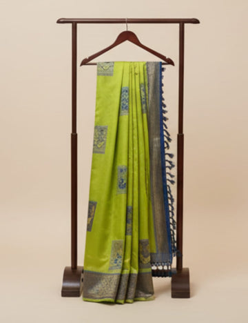 Radiant Lime Green Silk Saree with Silver Zari Border