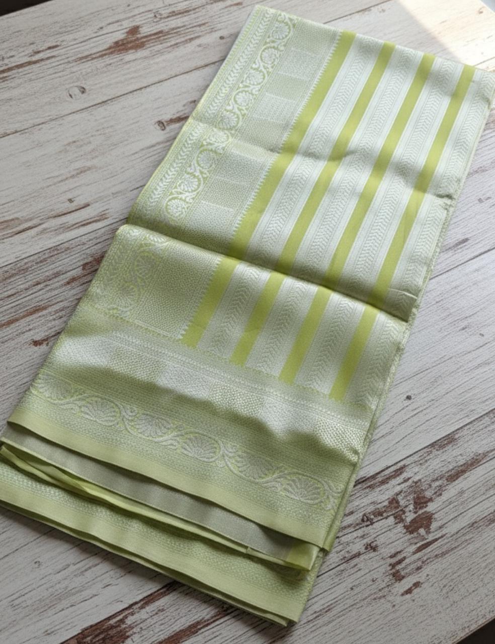 Elegant Light Green Silk Saree with Subtle Self-Design