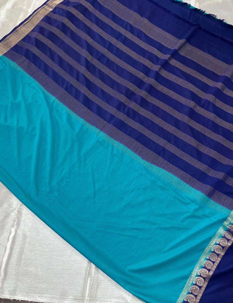 “Teal Crepe Silk Saree with Elegant Dark Navy Blue Border”