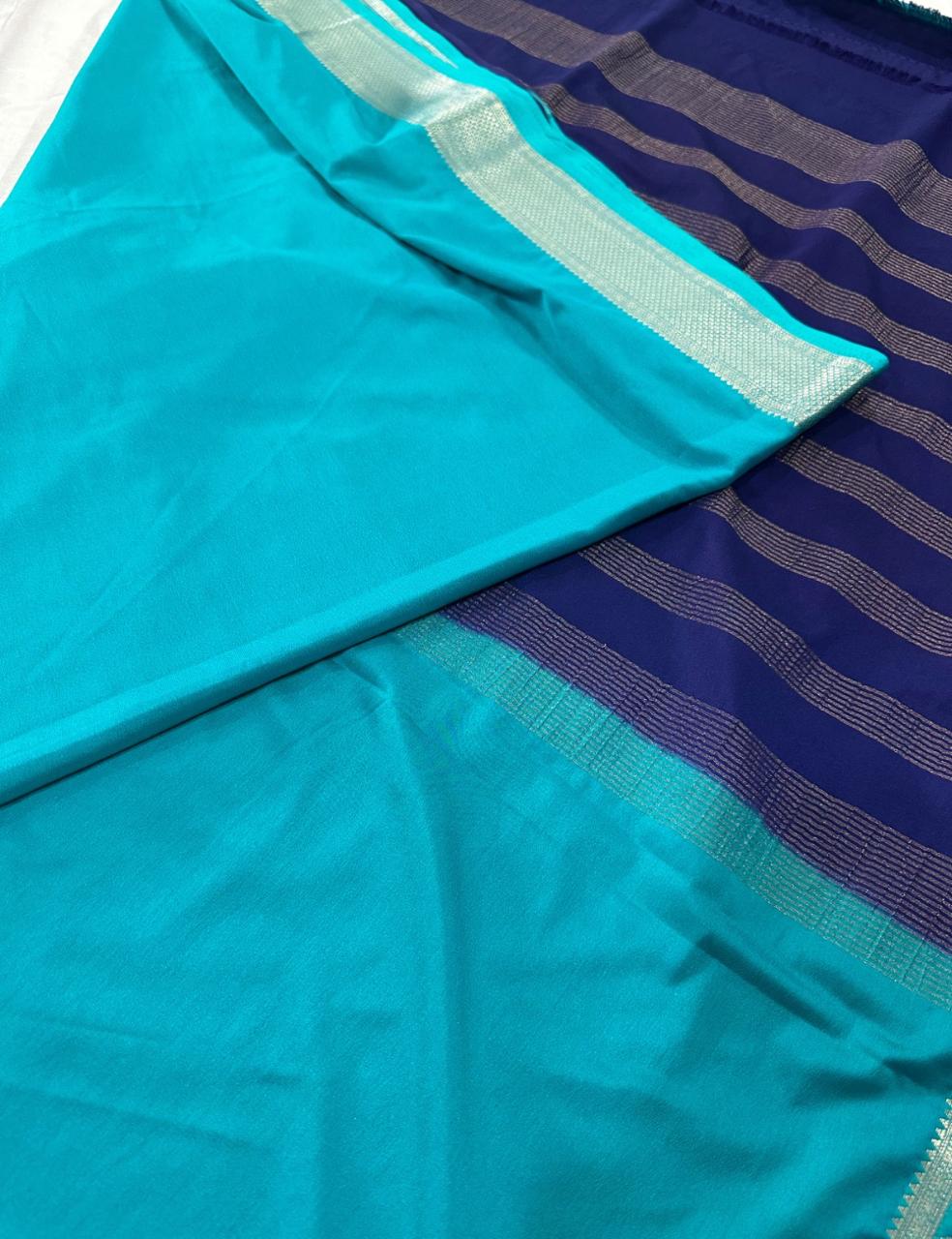“Teal Crepe Silk Saree with Elegant Dark Navy Blue Border”