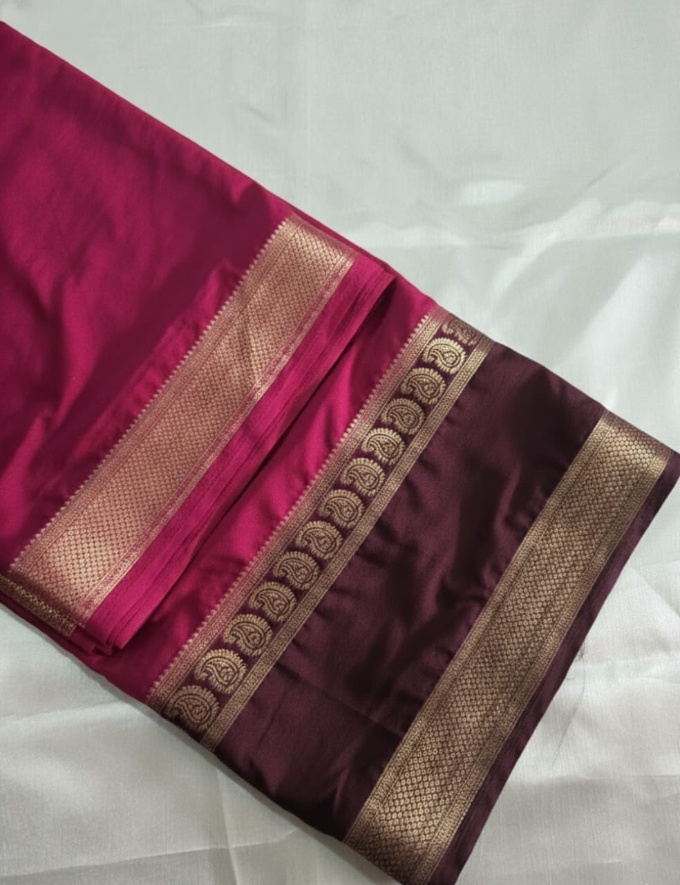 “Dark Maroon Crepe Silk Saree And Coffee With Zari Border”