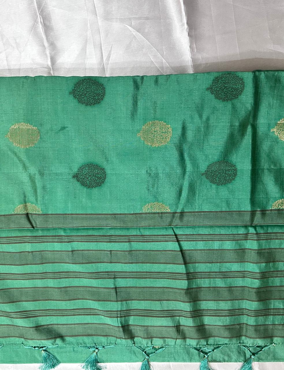 Graceful Emerald Green Pure Tussar Silk Saree with Zari Leaf Motifs and Elegant Border