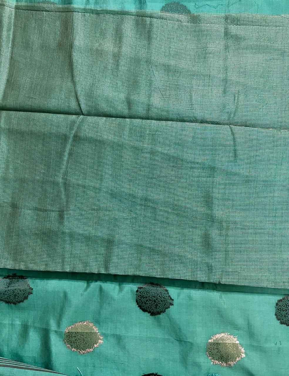 Graceful Emerald Green Pure Tussar Silk Saree with Zari Leaf Motifs and Elegant Border