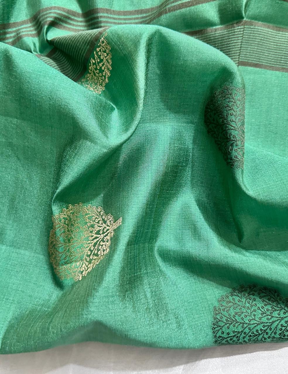 Graceful Emerald Green Pure Tussar Silk Saree with Zari Leaf Motifs and Elegant Border