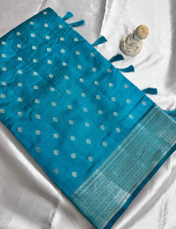 Teal Blue Tussar Silk Saree with Silver Zari Butta and Woven Border