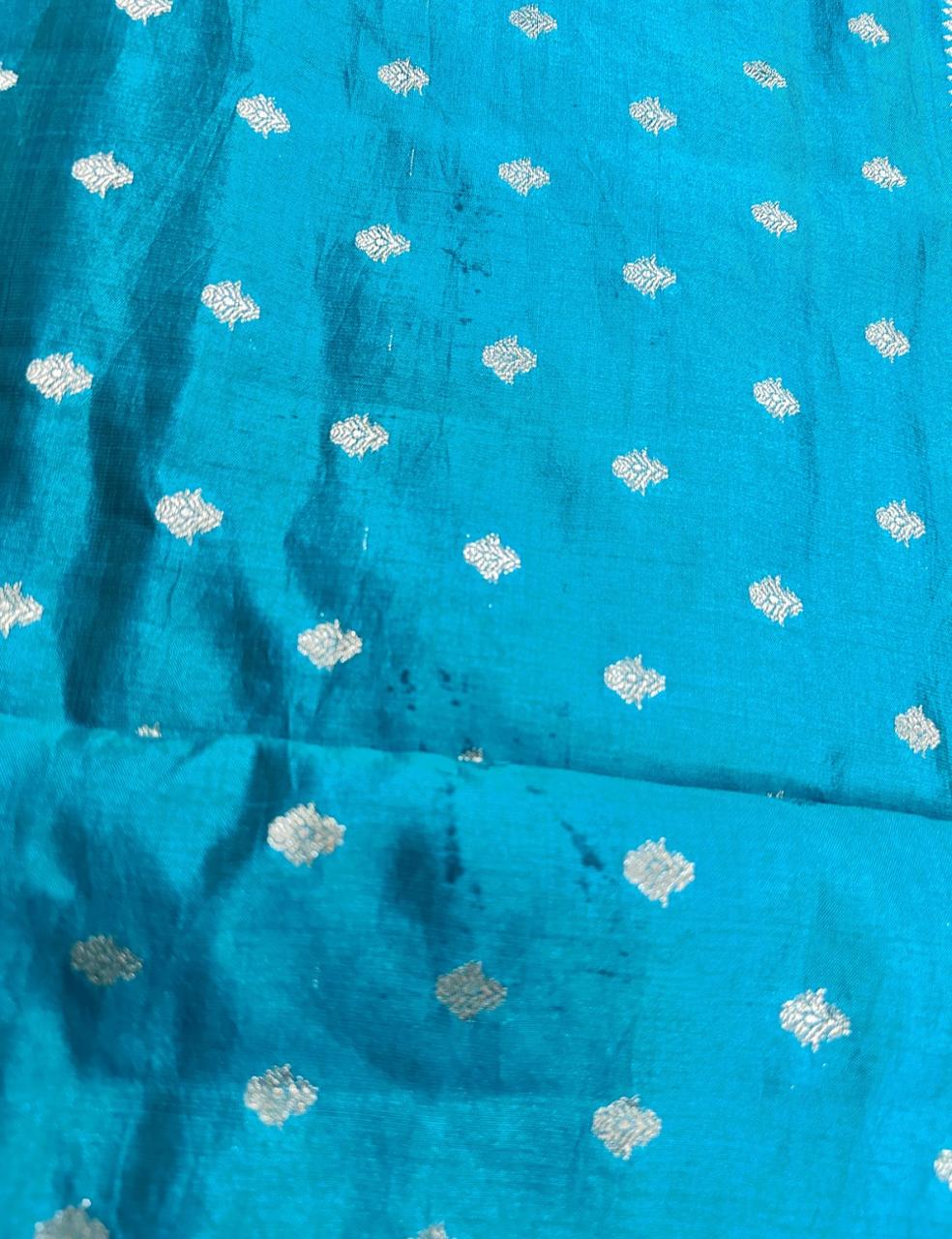 Teal Blue Tussar Silk Saree with Silver Zari Butta and Woven Border