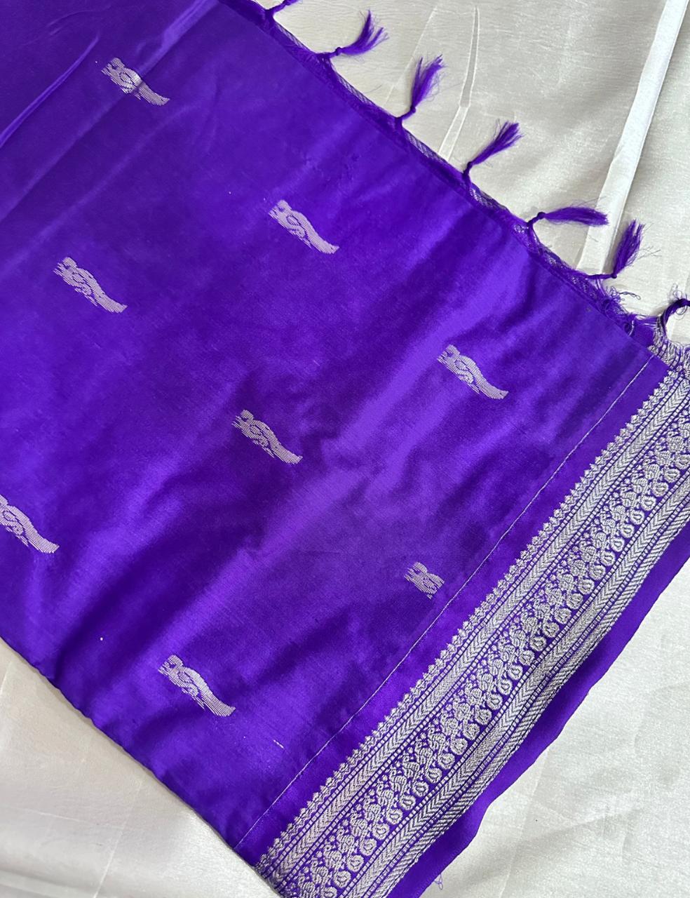 Royal Violet Tussar Silk Saree with Silver Zari Peacock Weaving and Tassel Border