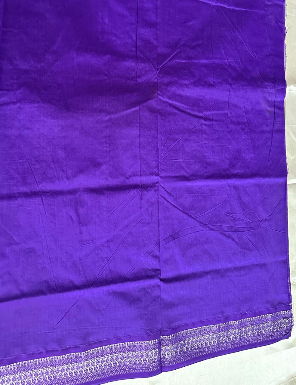 Royal Violet Tussar Silk Saree with Silver Zari Peacock Weaving and Tassel Border