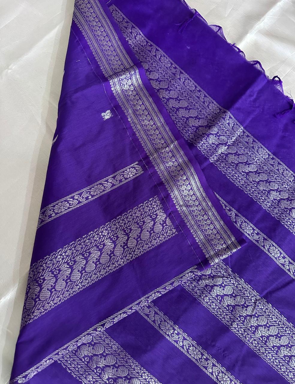 Royal Violet Tussar Silk Saree with Silver Zari Peacock Weaving and Tassel Border