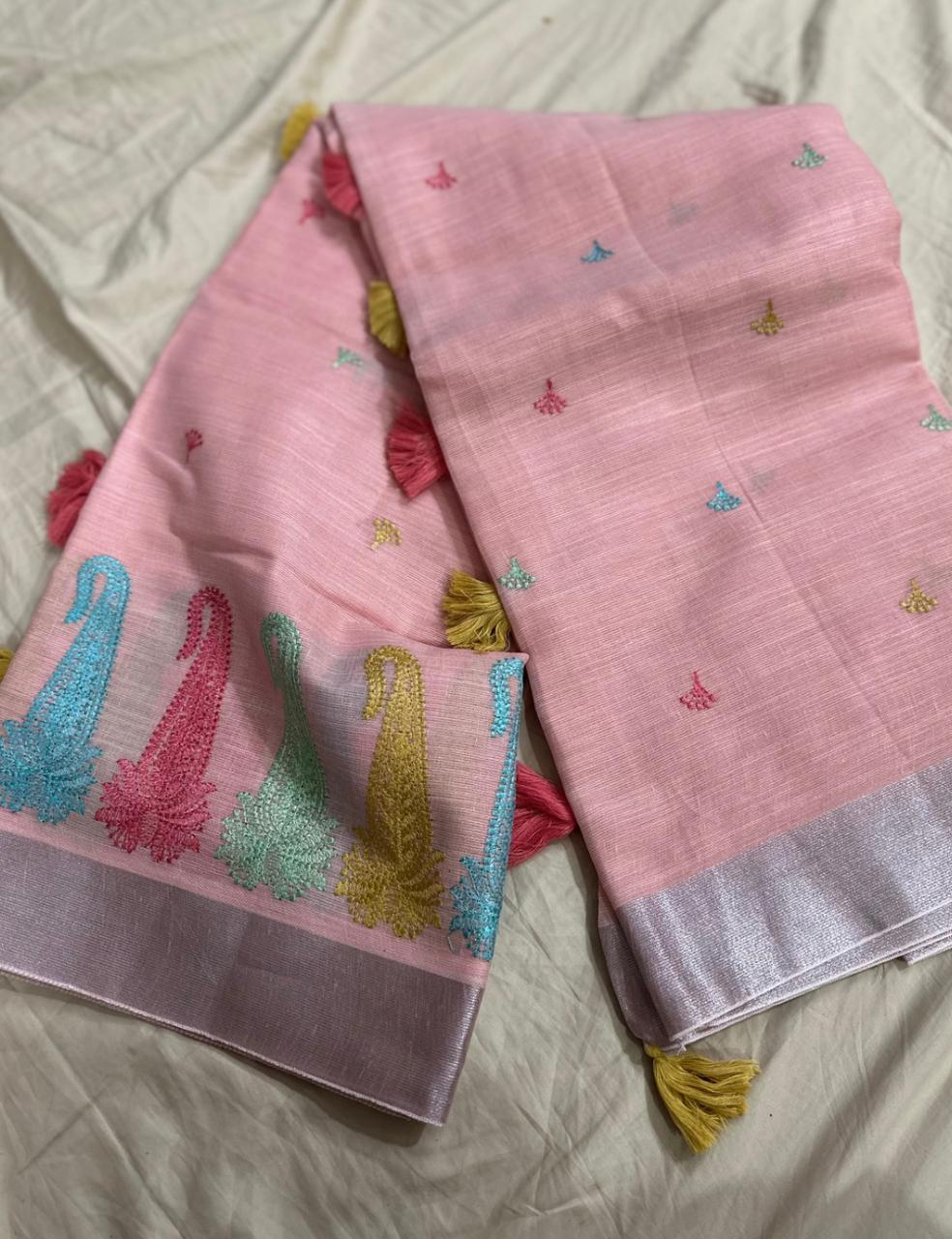 Graceful Pink Linen Saree with Colorful Tassels