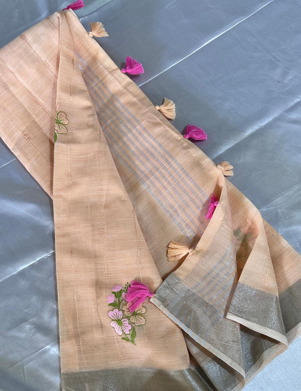 Elegant Peach Linen Cotton Saree with Floral Embroidery & Silver Border