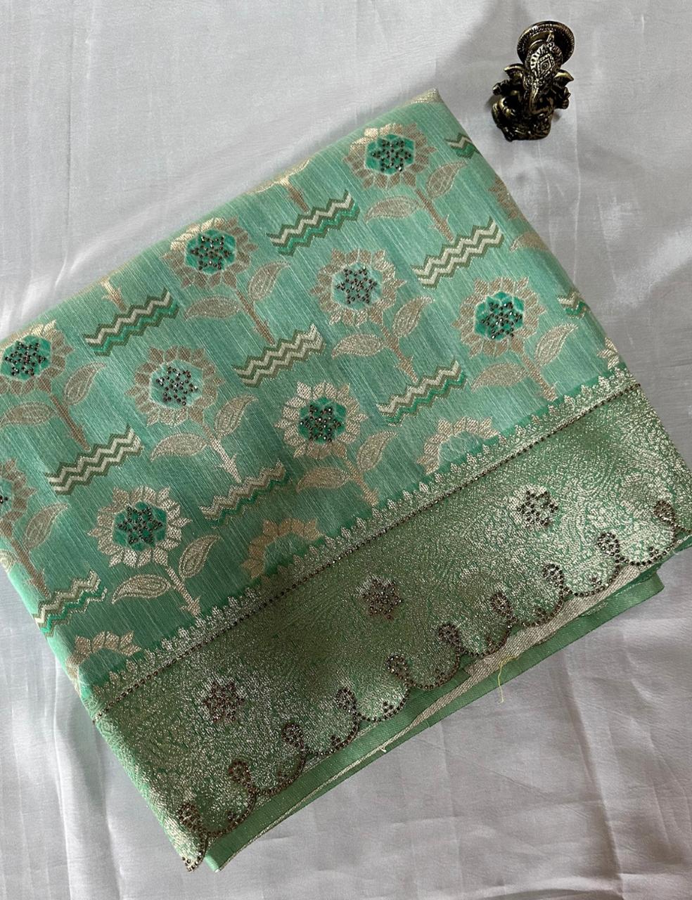 Mint Green Tussar Silk Saree with Floral Zari Butta and Scalloped Border