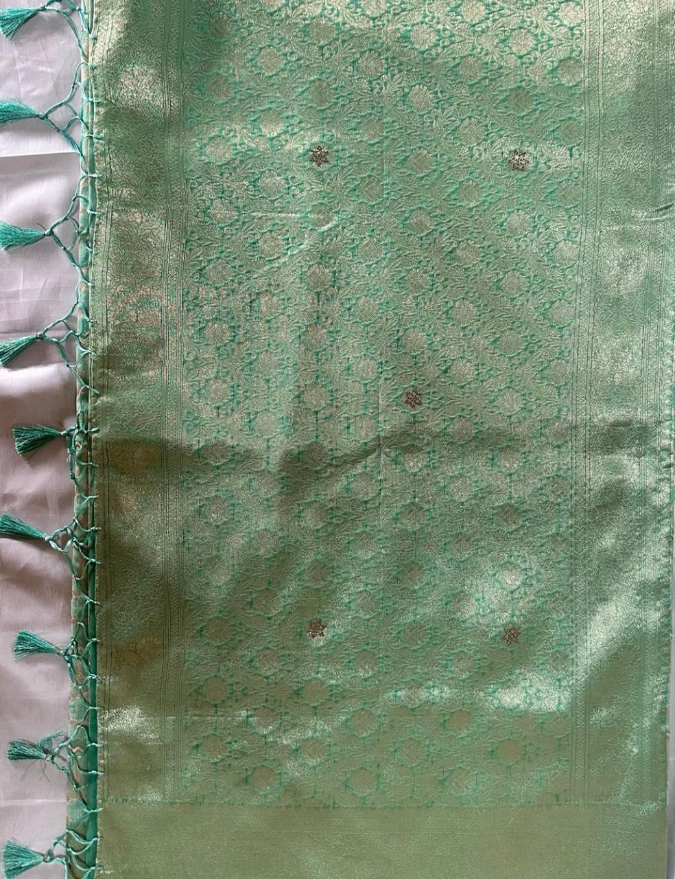 Mint Green Tussar Silk Saree with Floral Zari Butta and Scalloped Border