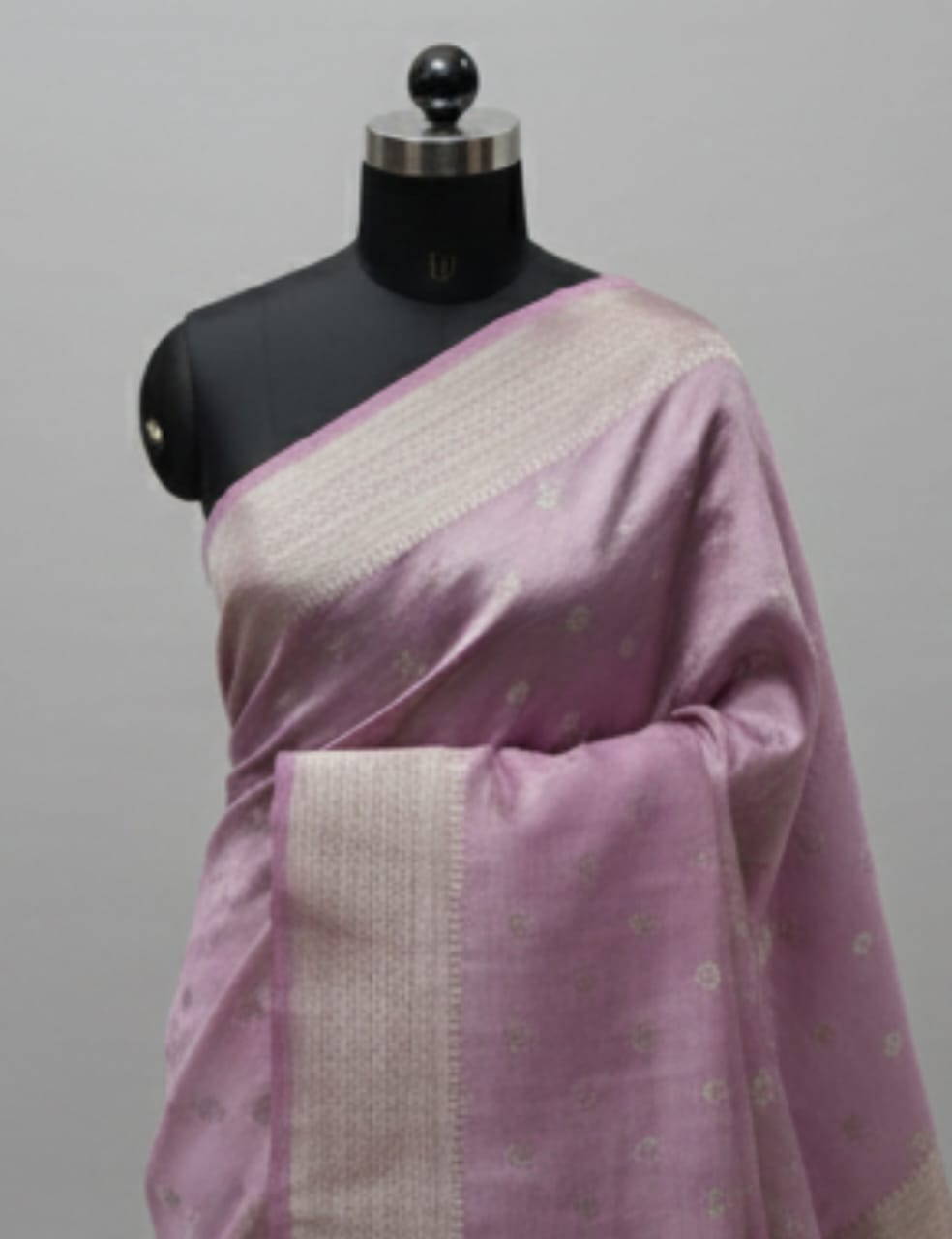 “Elegant Cream Tassar Silk Saree with Golden Woven Motifs and Tassel Border”