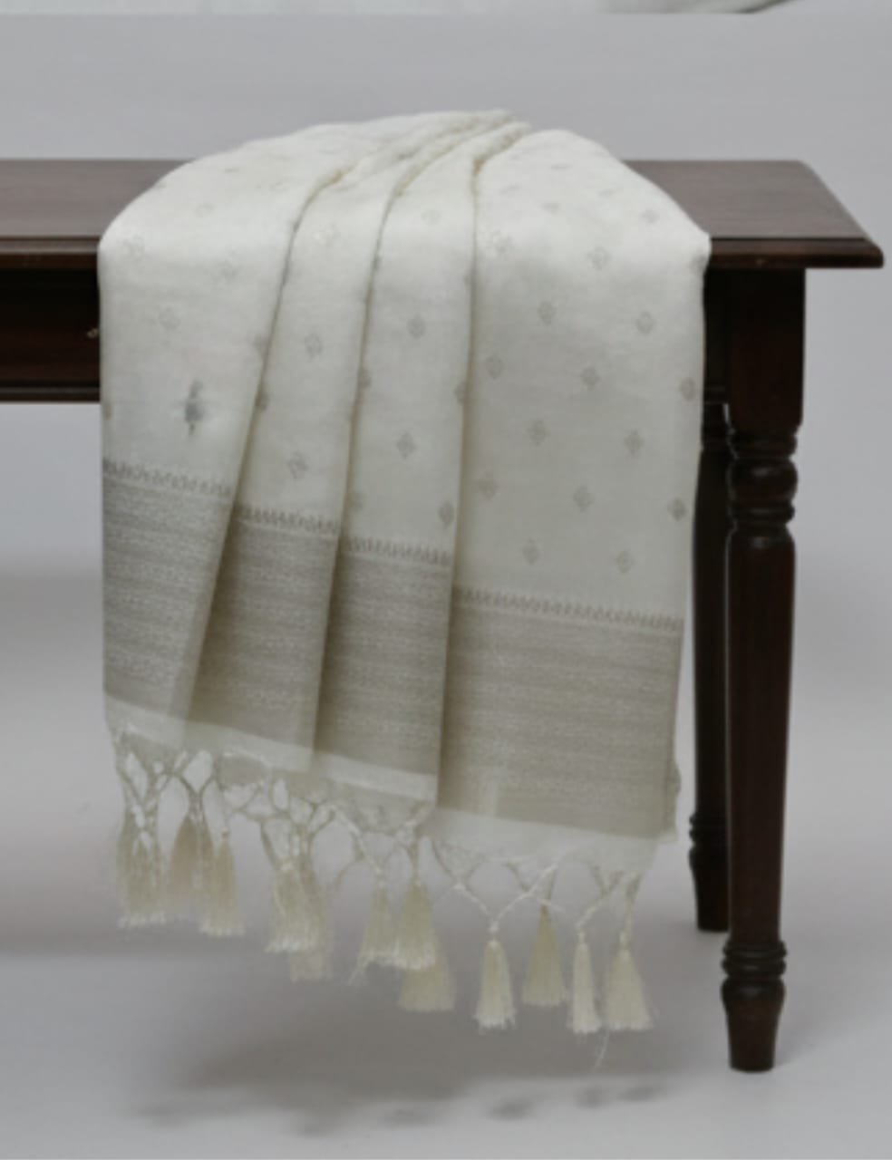 Pure White Tussar Silk Saree with Subtle Woven Motifs & Elegant Zari Border ✨"