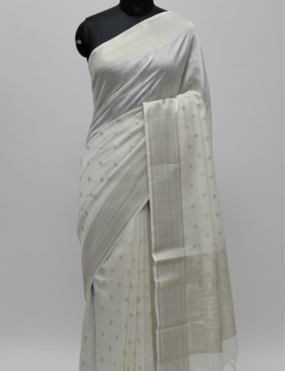 Pure White Tussar Silk Saree with Subtle Woven Motifs & Elegant Zari Border ✨"