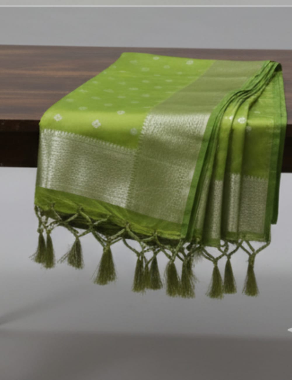 “Elegant Cream Tassar Silk Saree with Golden Woven Motifs and Tassel Border”