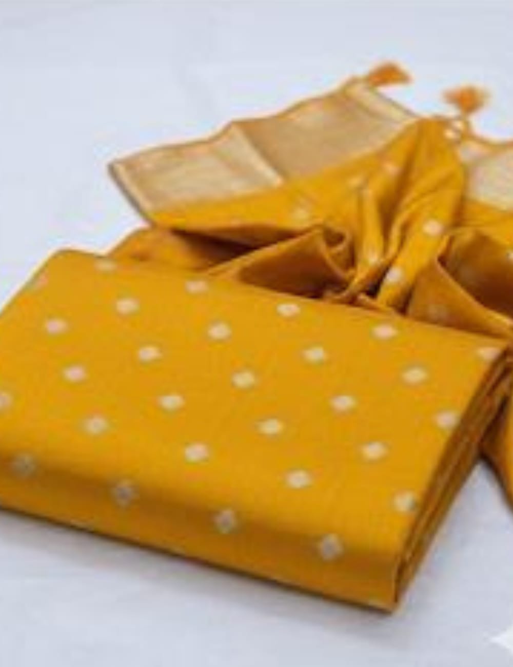 "Radiant Yellow Tussar Silk Saree with Elegant Zari Detailing & Tassel Finish ✨"