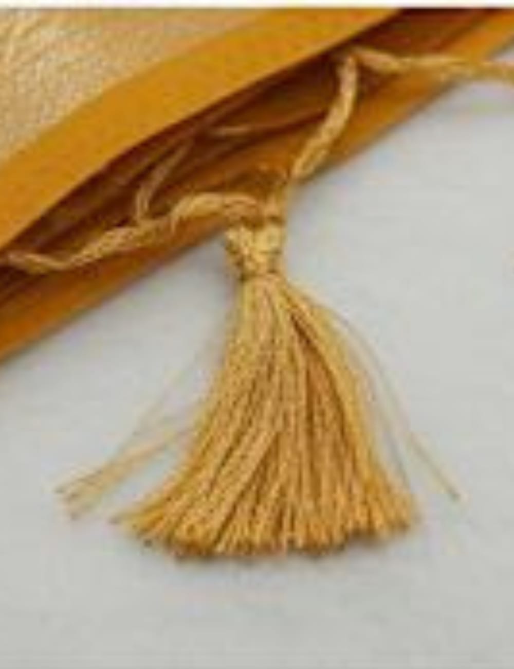 "Radiant Yellow Tussar Silk Saree with Elegant Zari Detailing & Tassel Finish ✨"