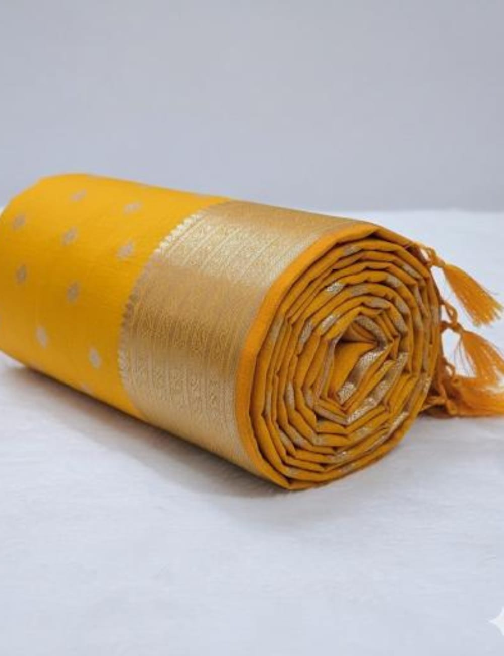 "Radiant Yellow Tussar Silk Saree with Elegant Zari Detailing & Tassel Finish ✨"