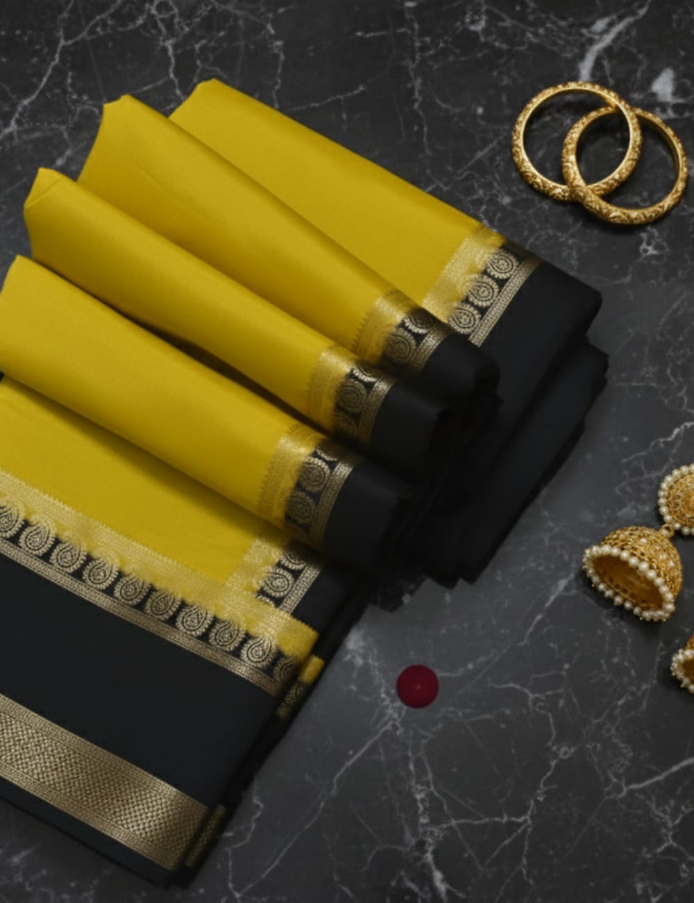 LEMON YELLOW AND NAVY BLUE CREPE SILK SAREE WITH A GOLDEN ZARI BORDER