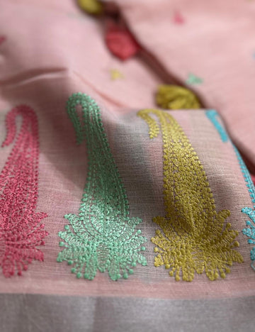 “ Pink Handloom Fabric with Colorful Embroidered Motifs ”