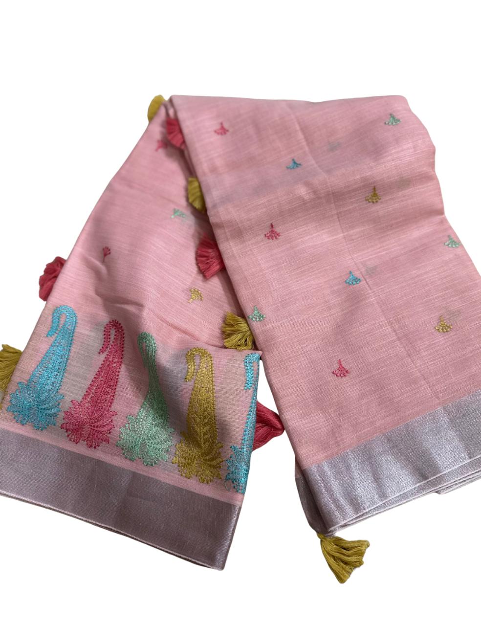 “ Pink Handloom Fabric with Colorful Embroidered Motifs ”