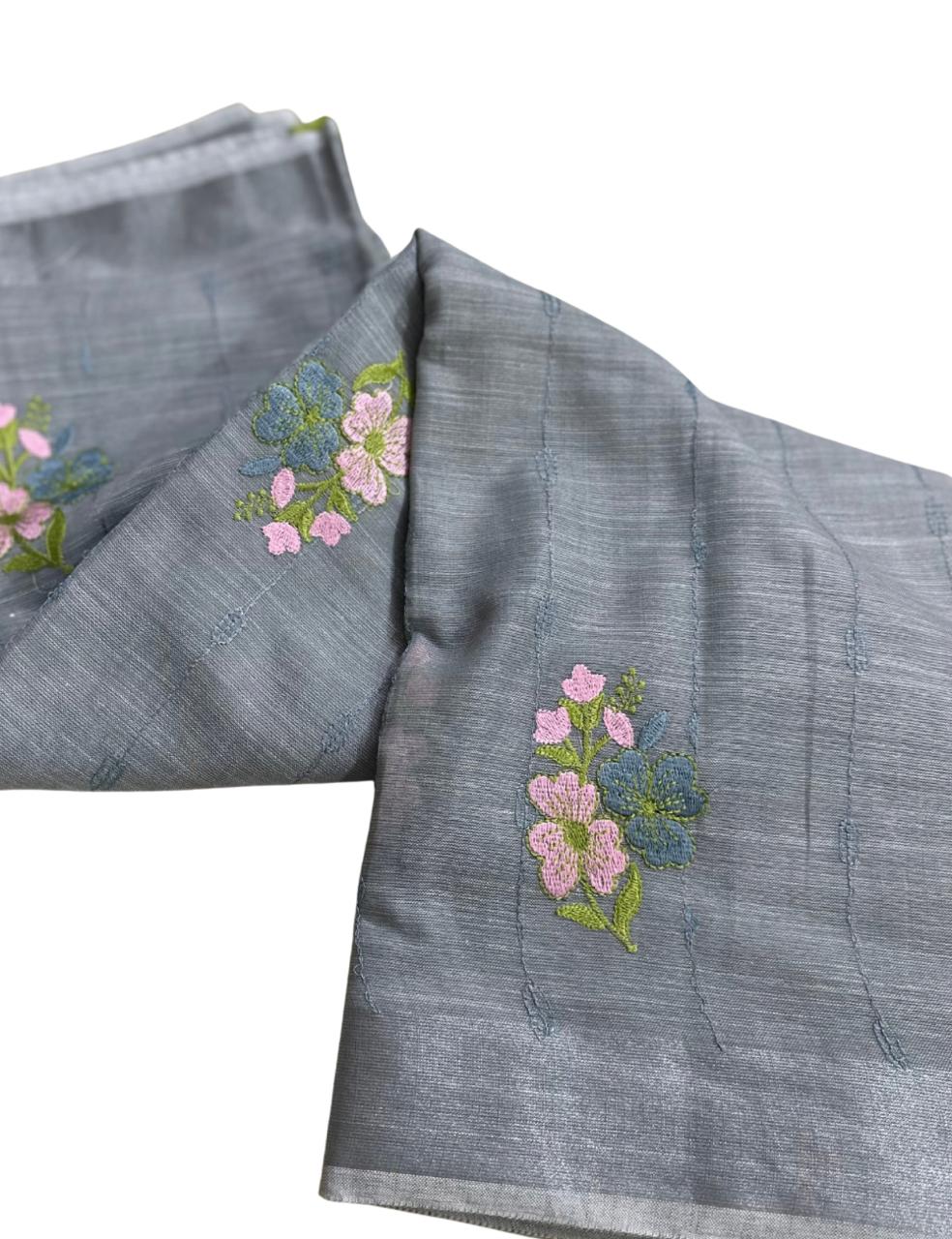 “Elegant Gray Handloom Saree with Floral Embroidery & Tassel Charm ”