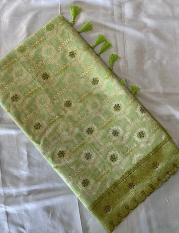 Premium Parrot Green Floral Woven Silk-Blend Saree with Tassels & Designer Border